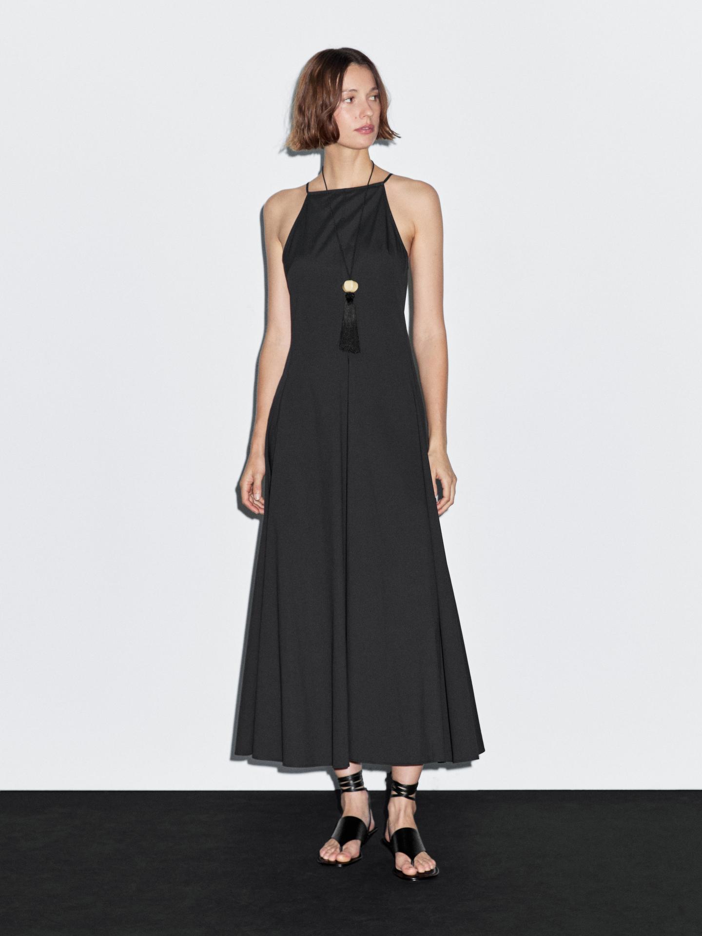 Long halter neck dress with flounce